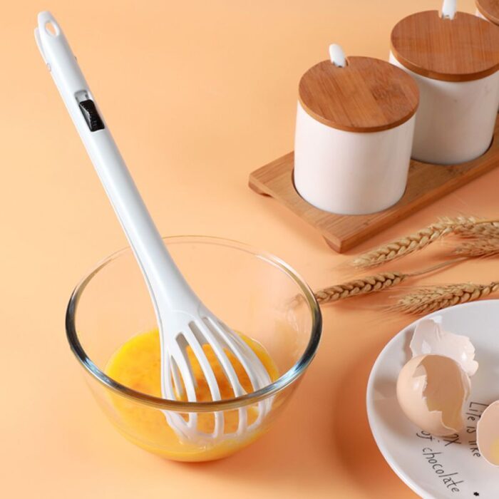 Multifunctional kitchen tong and egg beater