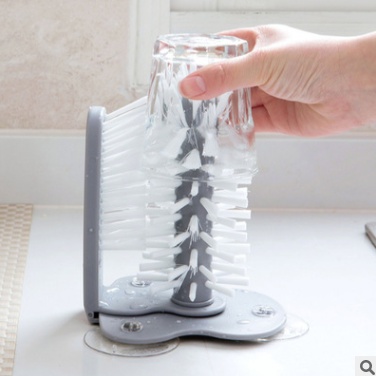 Suction cup cleaning brush